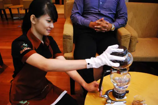 Staff At Rollaas Cafe Making Kopi Luwak Coffee